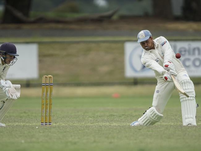 Langwarrin’s Robbie “Wizz’’ Lancaster hits out against Old Peninsula on Saturday. Picture: Valeriu Campan