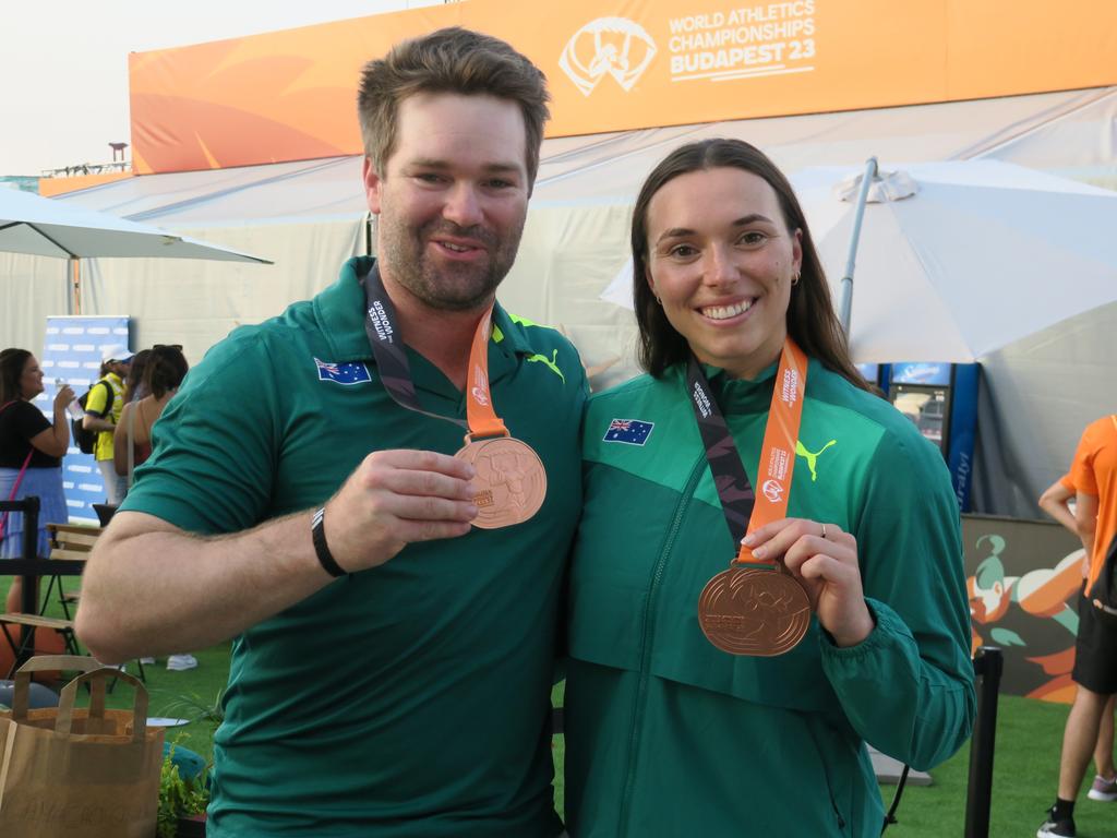 Little with her coach Angus McEntyre. Picture: Andrew Heil