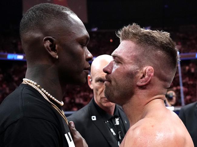 LAS VEGAS, NEVADA - JULY 08: UFC middleweight champion Israel Adesanya faces off against Dricus Du Plessis of South Africa during the UFC 290 event at T-Mobile Arena on July 08, 2023 in Las Vegas, Nevada. (Photo by Jeff Bottari/Zuffa LLC via Getty Images)