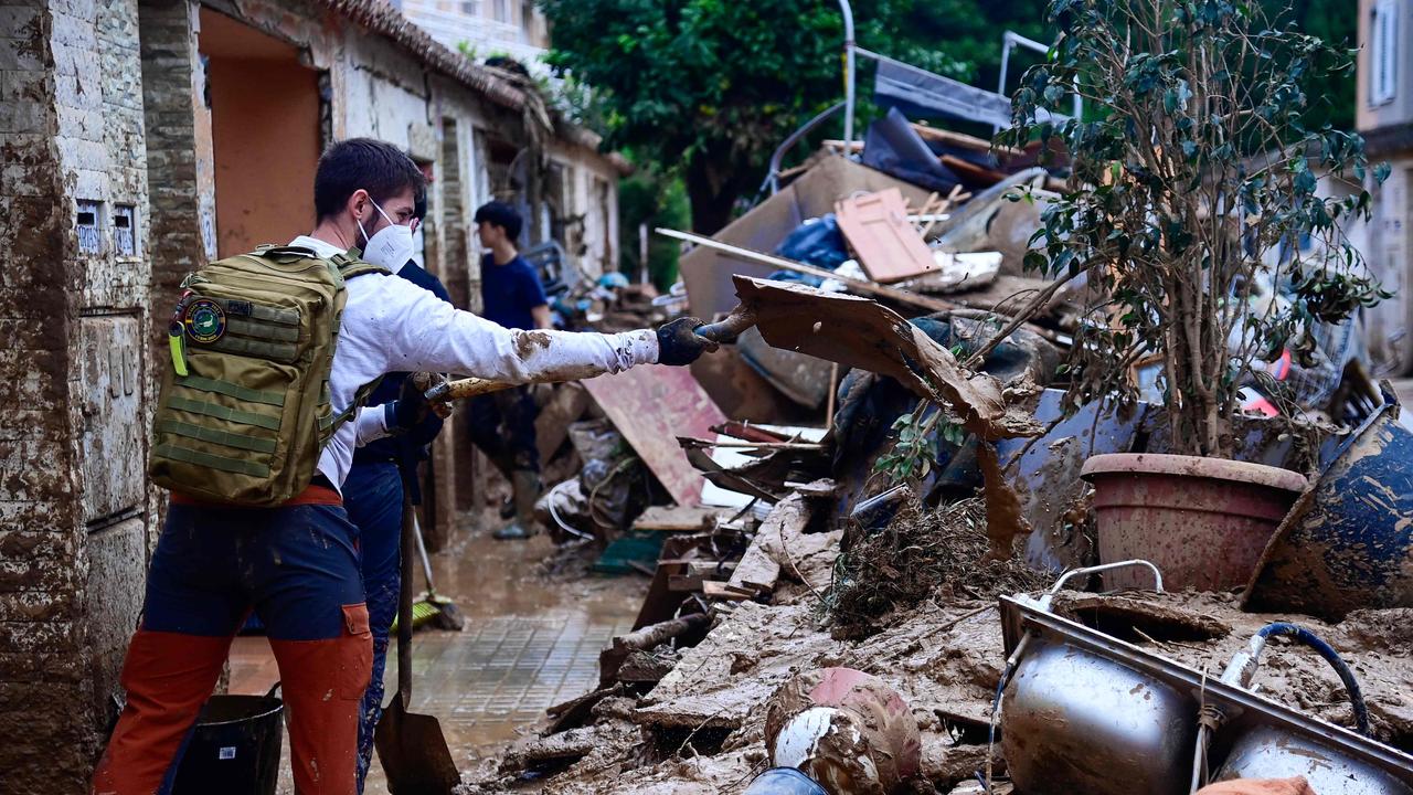 A devastating post-flood scene in Spain that’s familiar to places like Brisbane which had a one-in-100-year floods twice in the space of a couple of years. Picture: JOSE JORDAN / AFP.