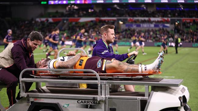 MELBOURNE, AUSTRALIA – MAY 11: Adam Reynolds of the Broncos is taken off the field on a stretcher after a head knock during the round 11 NRL match between Melbourne Storm and Brisbane Broncos at AAMI Park on May 11, 2023 in Melbourne, Australia. (Photo by Robert Cianflone/Getty Images)