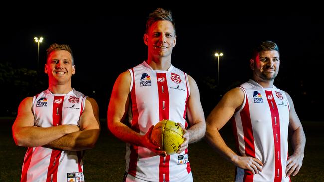 Walkerville playing coach Ryan Madden (centre) with players Sean Kuerschner and Adam Law in the 1901 replica guernseys the Cats will wear this Saturday for their 120th anniversary celebration. Picture: Morgan Sette