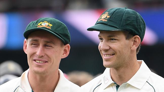 Marnus Labuschagne and Tim Paine of Australia watch on ahead of the presentations following the third Test Match between Australia and New Zealand at the SCG in Sydney, Monday, January 6, 2020. (AAP Image/Dan Himbrechts) NO ARCHIVING, EDITORIAL USE ONLY, IMAGES TO BE USED FOR NEWS REPORTING PURPOSES ONLY, NO COMMERCIAL USE WHATSOEVER, NO USE IN BOOKS WITHOUT PRIOR WRITTEN CONSENT FROM AAP