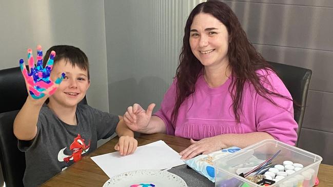 Sarah, pictured here with her son Alec, 7, is creating scrapbooks and memory boxes for her children to remember her by. Picture: Supplied by family