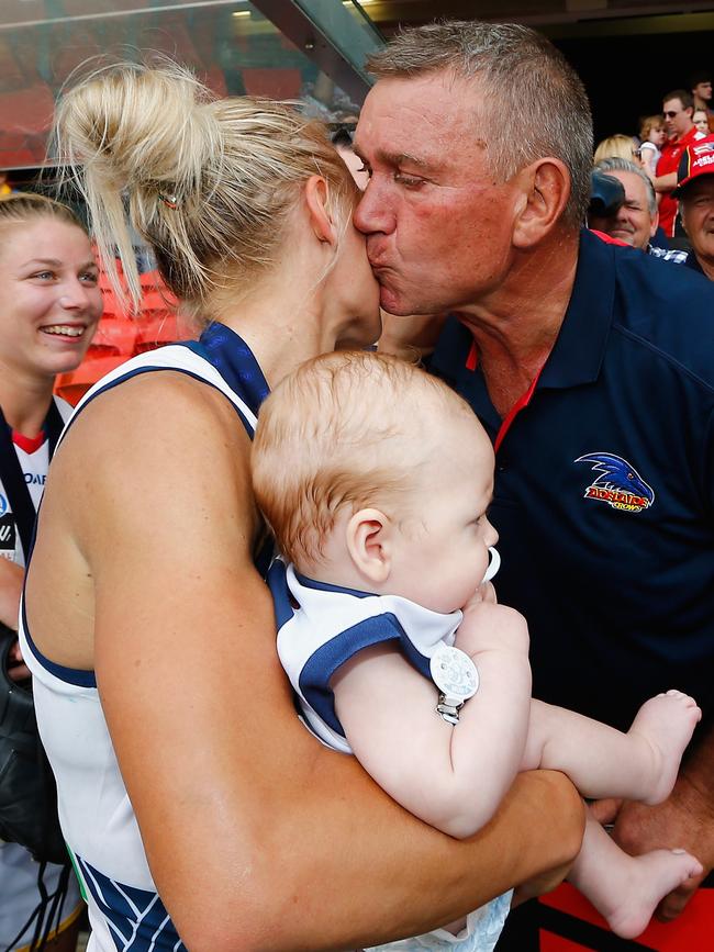 Greg Phillips celebrates with Erin after she claimed the inaugural AFLW premiership with the Crows. Picture: Jason O'Brien/Getty Images