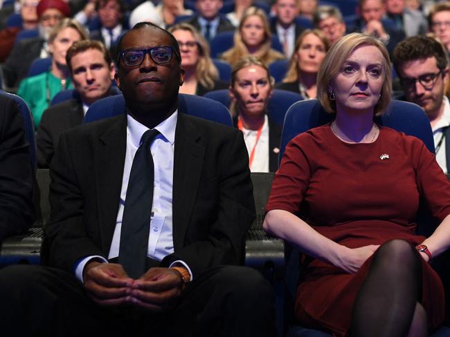 (FILES) In this file photo taken on October 2, 2022 Britain's Chancellor of the Exchequer Kwasi Kwarteng (L) and Britain's Prime Minister Liz Truss (R) attend the opening day of the annual Conservative Party Conference in Birmingham, central England. - Kwarteng has been sacked, the BBC and Sky News reported on October 14, 2022 quoting unnamed sources, as Truss tries to save her beleaguered premiership. (Photo by Oli SCARFF / AFP)