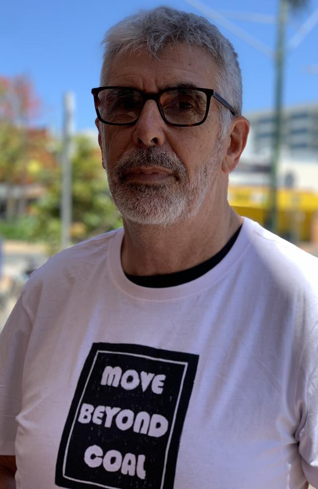 Move Beyond Coal protester Peter McCallum outside the NAB branch on Victoria St in Mackay on November 11, 2022. Picture: Duncan Evans