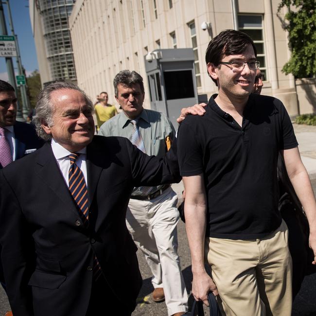 Martin Shkreli (R – smirking) with his lawyer shortly after being found guilty of three counts involving securities fraud and conspiracy to commit securities and wire fraud in 2017. Picture: Drew Angerer / Getty Images / AFP