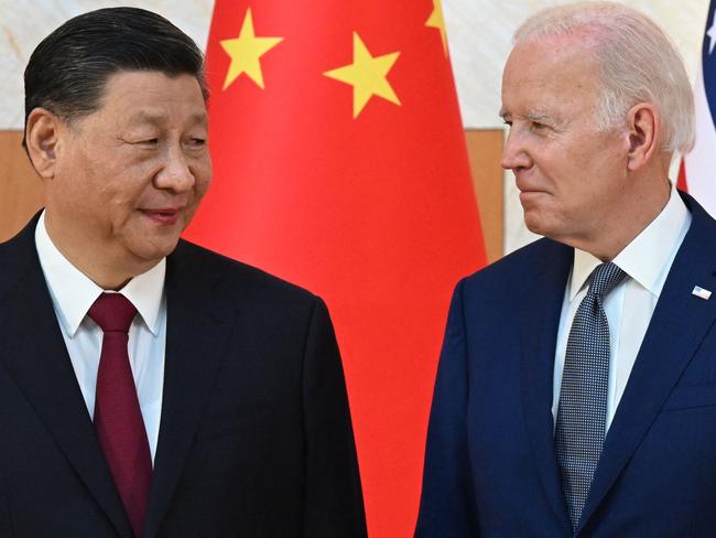 (FILES) In this file photo taken on November 14, 2022 US President Joe Biden (R) and China's President Xi Jinping meet on the sidelines of the G20 Summit in Nusa Dua on the Indonesian resort island of Bali. - Xi Jinping was handed a third term as Chinese president on March 10, 2023, capping a rise that has seen him become the country's most powerful leader in generations. (Photo by SAUL LOEB / AFP)