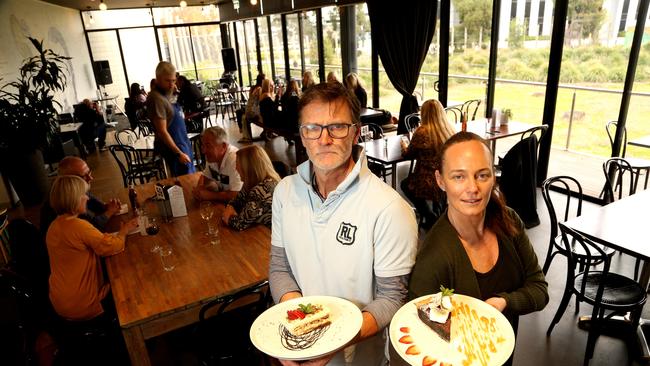 Franz Madlener (left) with wife Brook Pollock at Arcobar in June. Picture: Hamish Blair