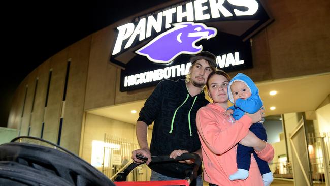 2/05/2015 Disappointed fans after the game between South and Crows was called off due to technical difficulties with the lights at Hickinbothan Oval. Soth fans Ashley Littler and Ashlea Baughan and baby Ryan Littler from Christies Beach who didn't get a refund and won't be able to make it tomorrow. Pic Mark Brake