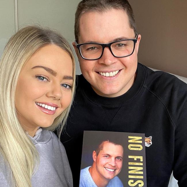 Ruffo with girlfriend Tahnee and his recently released memoir.