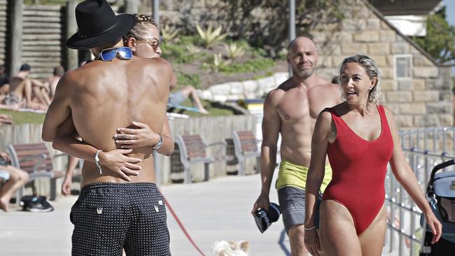 Beachgoers get up close and personal at a packed Bondi in Sydney’s east on Thursday. Picture: Adam Yip