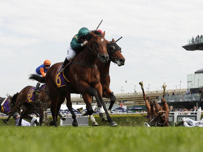 SYDNEY, AUSTRALIA - APRIL 13: Andrew Adkins riding War Baron (R) and Glyn Schofield riding Persan (L) fall during race 1 the Kings Of Sydney Sport Mile during The Championships Day 2 at Royal Randwick Racecourse on April 13, 2019 in Sydney, Australia. (Photo by Mark Metcalfe/Getty Images)