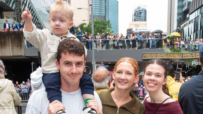 Thousands of people have braved the rain to gather in Brisbane for Anzac Day services. Picture: Grace Kessels