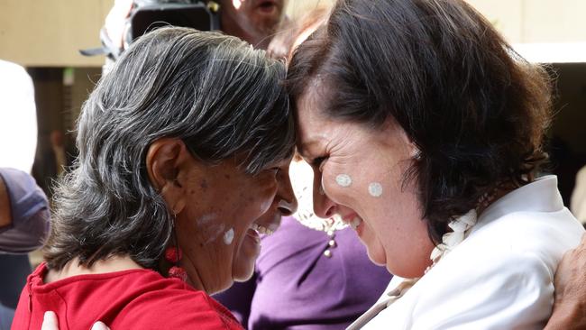 Evelyn Parkin embraces Leeanne Enoch, the first Aboriginal woman MP in Queensland. Picture: Liam Kidston