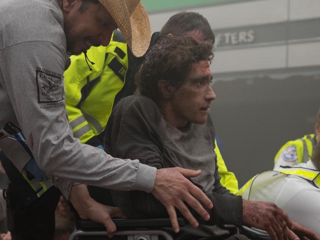 This scene from Stronger, with Gyllenhaal and Carlos Sanz as the man who helped save Jeff’s life, recreates the famous image of Bauman that was beamed around the world in the aftermath of the Boston Marathon bombing in 2013. Picture: Roadshow