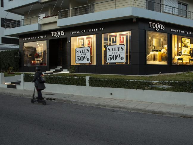 The Togas textiles shop on Vouliagmenis Avenue in Glyfada, a year after it was firebombed. Picture: Daphne Tolis