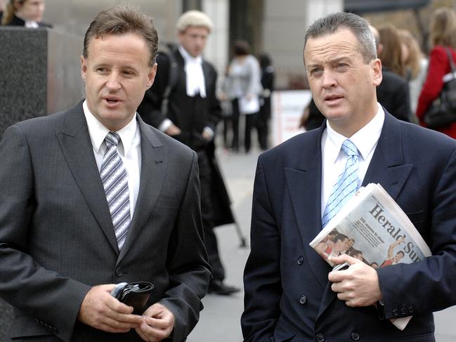 Journalists Michael Harvey and Gerard McManus outside Melbourne County Court in 2007