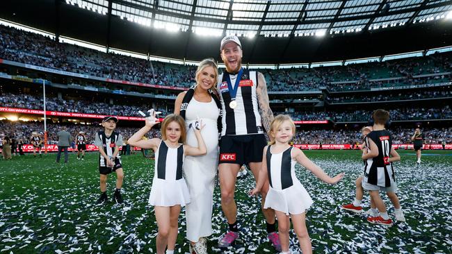 Jack and Mikayla Crisp and their children Lilah and Sloane celebrate the Premiership win. Picture: Getty