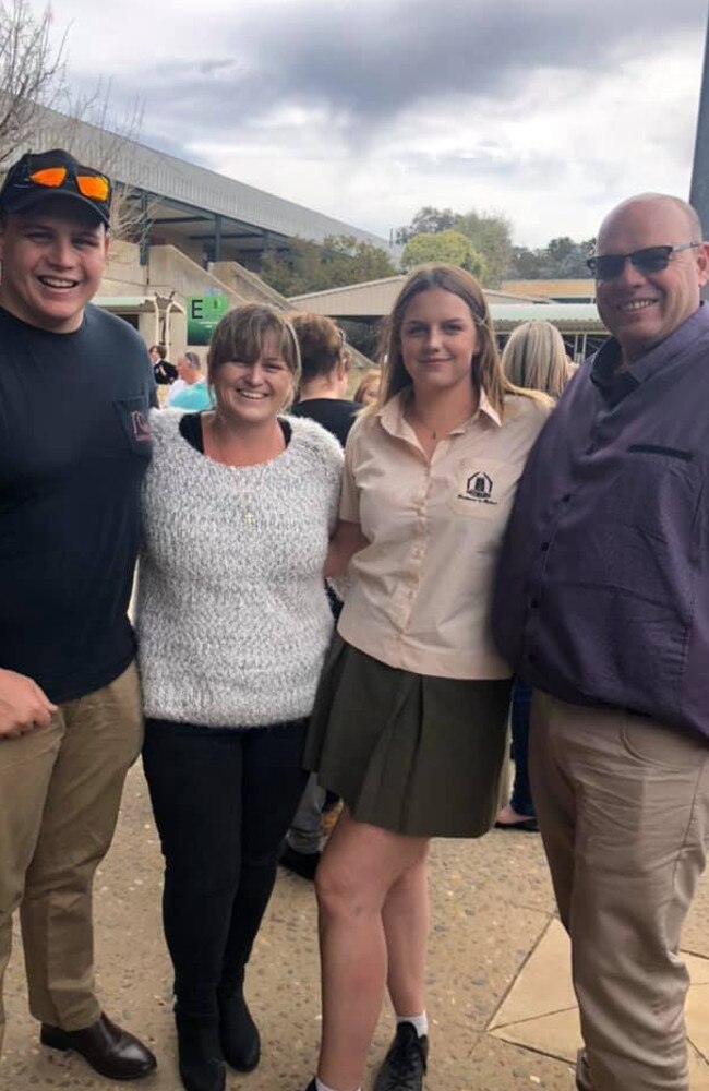 RFS Brigade Captain Jamie Buck (R) with his family L-R: Son Josh, wife Amanda and daughter Kaelisha. Supplied