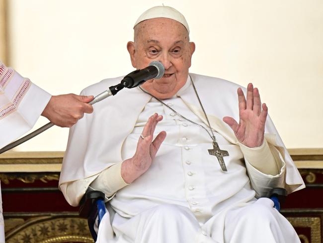 Pope Francis greets the crowd at the end of the mass for Palm Sunday at St Peter's square in the Vatican. Picture: AFP