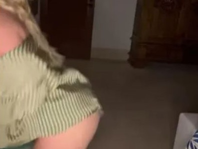 In her latest video offering, she wore a green striped dress and showed off her bare butt. Picture: Instagram