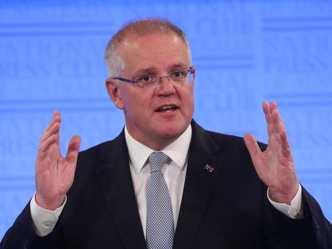 Minister for Finance Mathias Cormann and Treasurer Josh Frydenberg as the Prime Minister Scott Morrison  addresses the National Press Club in Canberra. Picture Kym Smith