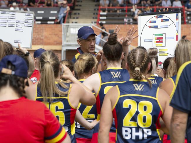 Crows coach Matthew Clarke instructs his players during their trial game at Richmond Oval. Picture: AAP/EMMA BRASIER