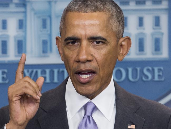 US President Barack Obama speaks during a surprise appearance at White House Press Secretary Josh Earnest's last daily press briefing of the Obama administration in the Brady Press Briefing Room at the White House in Washington, DC, January 17, 2017. / AFP PHOTO / SAUL LOEB