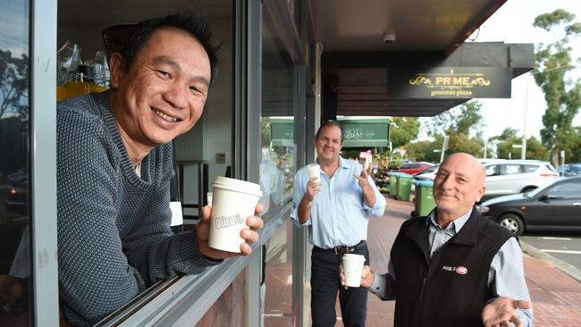 Ringwood East traders including Vin Nham, Stuart Greig and Arturs Corcoris are hoping restrictions will be lifted on Monday to inject a bit more life into their shopping strip. Picture: Josie Hayden