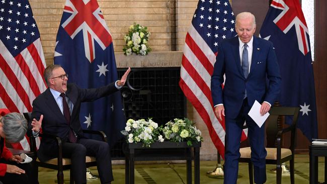 US President Joe Biden stages a mock walk out on Australian Prime Minister Anthony Albanese at their first bilateral meetings. Picture: AFP.