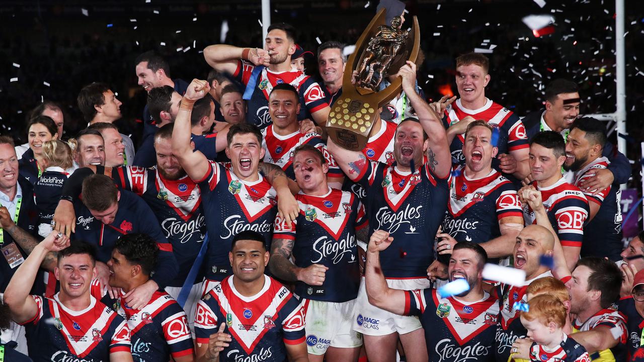 The Sydney Roosters celebrate with the Provan-Summons Trophy. Picture. Phil Hillyard