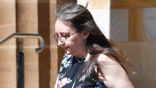 Jenny Hallam leaves the Adelaide Magistrates Court on Friday. Picture: AAP Image/David Mariuz