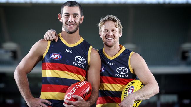 Former co-captain Taylor Walker and new solo-skipper Rory Sloane in Round 1 of last season. Picture: Sarah Reed