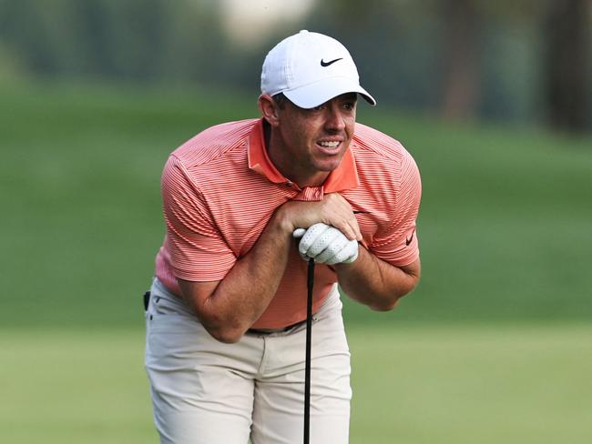 Northern Ireland's Rory McIlroy lines up a shot on day four of the Dubai Desert Classic 2025 golf tournament at the Emirates Golf Club in Dubai on January 19, 2025. (Photo by Fadel Senna / AFP)