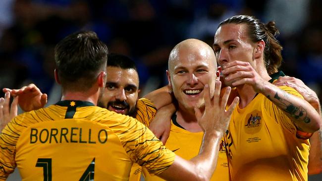 KUWAIT CITY, KUWAIT - SEPTEMBER 10: Aaron Mooy of Australia celebrates with his team scoring the third goal during the FIFA World Cup Qatar 2022 and AFC Asian Cup China 2023 Preliminary Joint Qualification Round 2 match between Kuwait and the Australia Socceroos at Kuwait Club Stadium on September 10, 2019 in Kuwait City, Kuwait. (Photo by Tom Dulat/Getty Images)