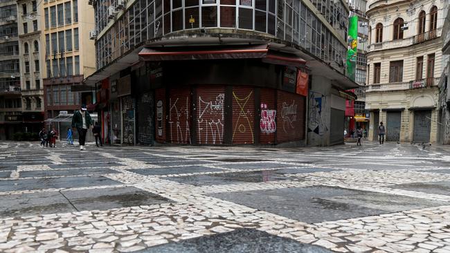 Closed stores and empty streets in Sao Paulo. Picture: AFP.