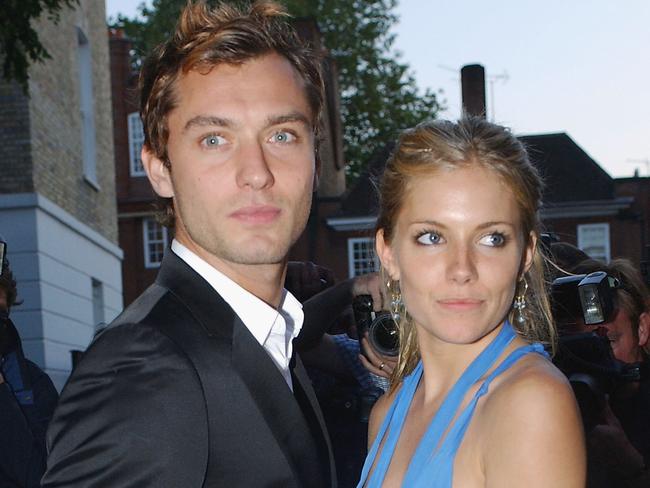 It was the on-again off-again relationship the media couldn’t get enough of. Sienna Miller pictured with Jude Law in 2004. Picture: Steve Finn/Getty Images