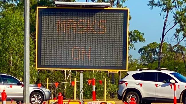 Cars line up for Covid-19 testing outside the Marrara netball stadium this morning. Picture: Gary Shipway