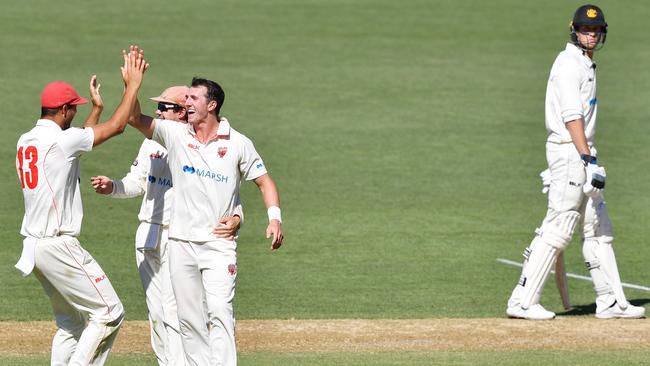 Wes Agar and Daniel Worrall celebrate after taking the final wicket at Adelaide Oval on Monday afternoon. Picture: AAP Image/David Mariuz