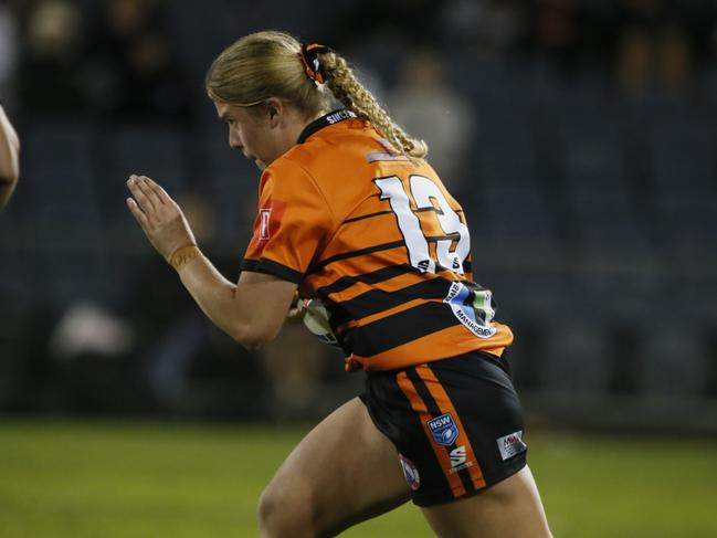 April Stevens in action during the Women’s Open Age grand final. Picture: Warren Gannon Photography