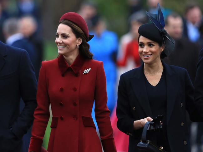 Catherine, Duchess of Cambridge and Meghan, Duchess of Sussex arrive to attend Christmas Day Church service at Church of St Mary Magdalene on the Sandringham estate. Picture: Getty