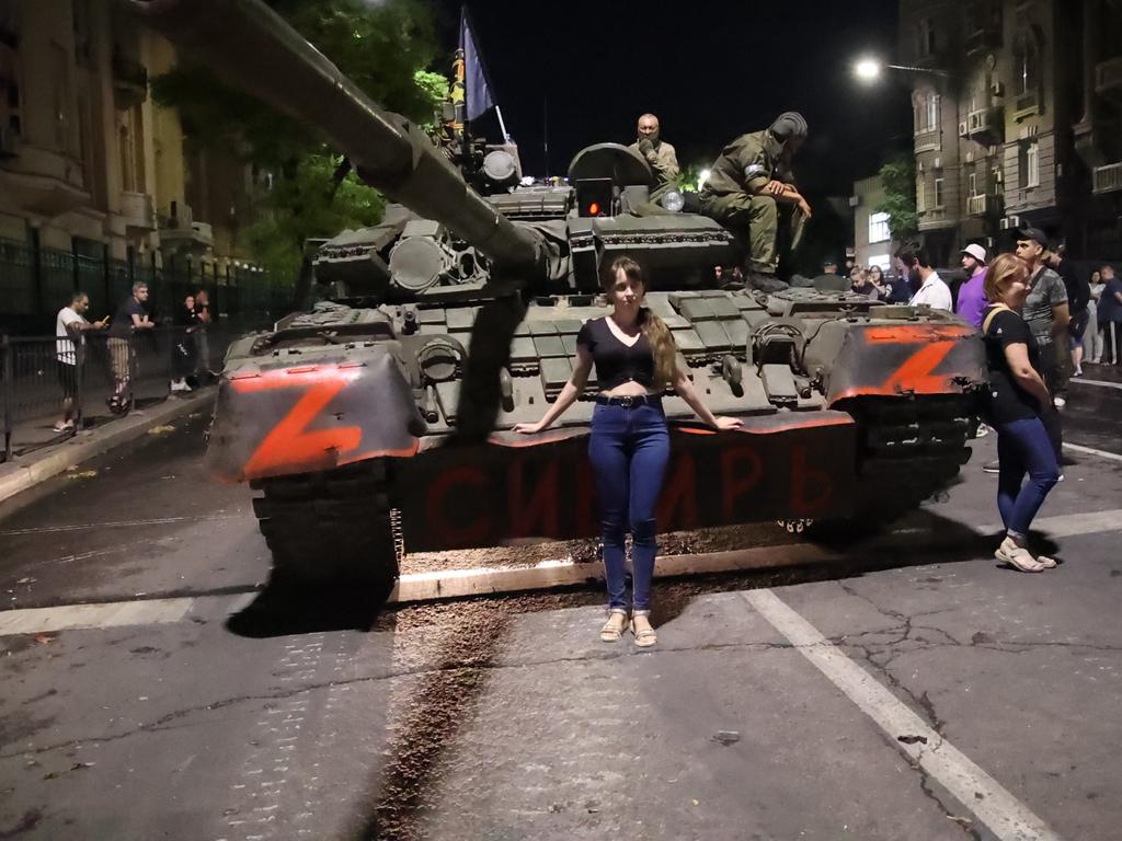 A woman poses for a photo in front of a Wagner Group military vehicle in Rostov-on-Don. Picture: Getty Images