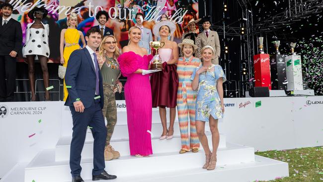 Launching the Melbourne Cup carnival at Flemington on Monday are (from left) trainer James Cummings, American singer Anastacia, Olympic gold medallist carnival ambassador Ariarne Titmus, Cup-winning jockey turned trainer Michelle Payne, Hall of Fame trainer Gai Waterhouse and star jockey Jamie Kah. Picture: Vince Caligiuri / Getty Image. Picture: Jason Edwards