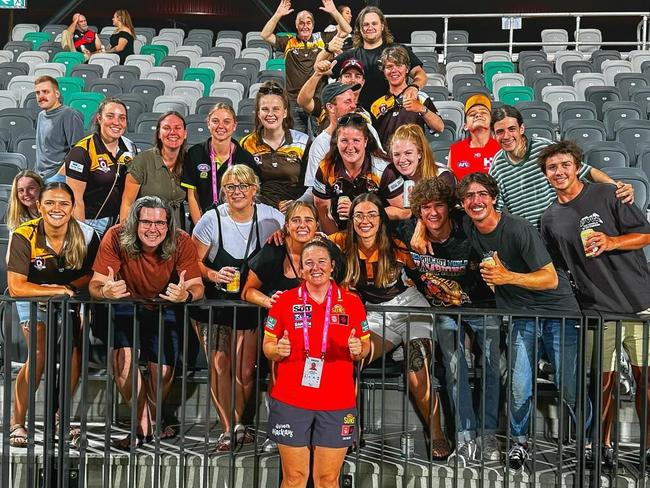 The Hawks faithful embracing Jen Revell after her round 10 AFLW coaching appearance in Mackay. Picture: Mackay City Hawks Facebook