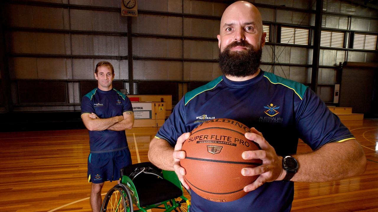 Townsville Veteran and Team Australia member Torben Louwen-Skovdam, with strength and conditioning coach Brian Heilbronn (left) at the Townsville Basketball Stadium, is set for the upcoming Invictus Games. Picture: Evan Morgan