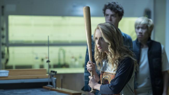 From left, Jessica Rothe as Tree Gelbman, Israel Broussard as Carter and Phi Vu as Ryan in "Happy Death Day 2U," written and directed by Christopher Landon.