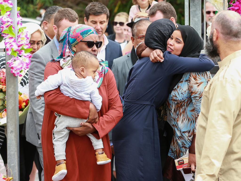 Prime Minister Jacinda Ardern hugs at the Kilbirnie Mosque. Picture: Getty Images