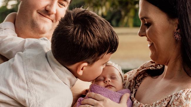 Samantha and Gene Campbell with Georgie and son Hugh a week before her heart surgery. Photo: Contributed